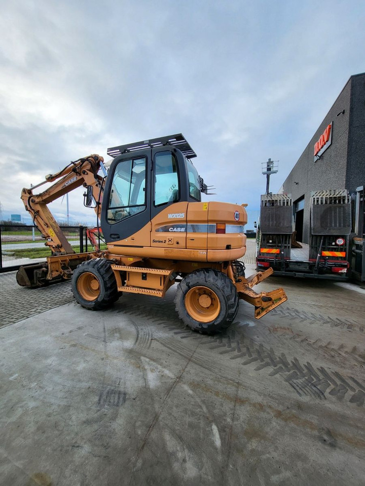 Case WX125 - Pelle sur pneus: photos 3 Case WX125 - Pelle sur pneus: photos 3