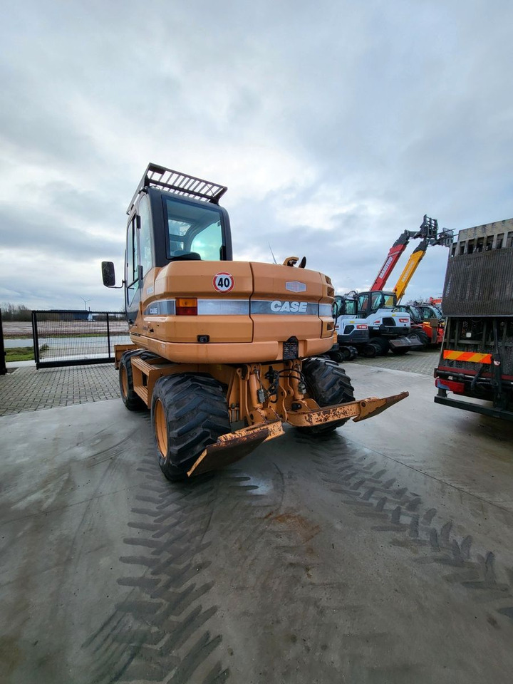 Case WX125 - Pelle sur pneus: photos 4 Case WX125 - Pelle sur pneus: photos 4