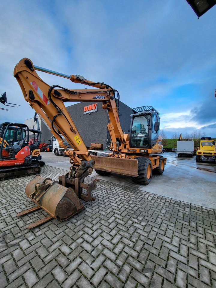 Case WX125 - Pelle sur pneus: photos 2 Case WX125 - Pelle sur pneus: photos 2