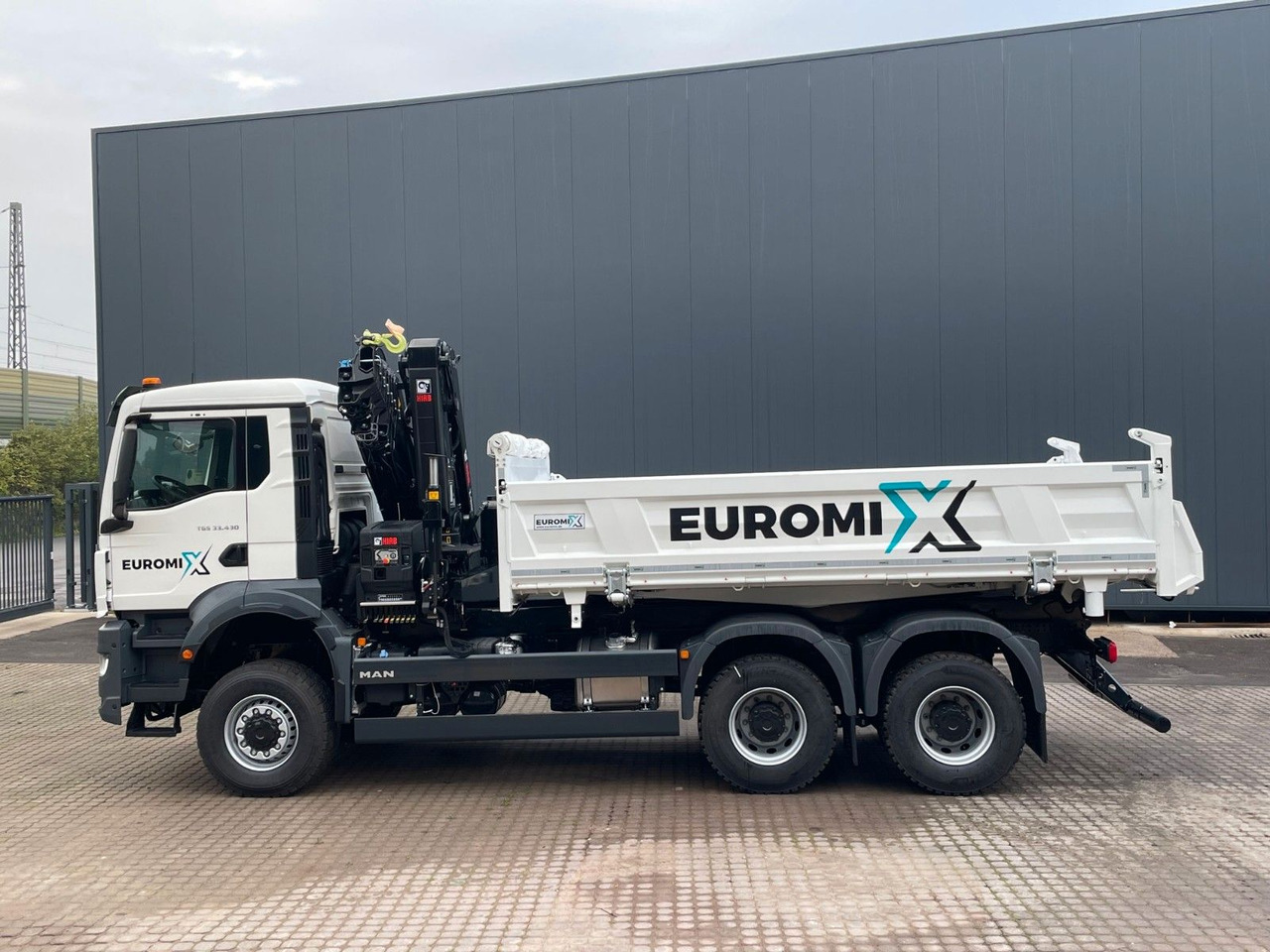 MAN TGS 33.440 6x6 /3-Seiten- Kipper / HIAB 228-6 - Camion benne, Camion grue: photos 2 MAN TGS 33.440 6x6 /3-Seiten- Kipper / HIAB 228-6 - Camion benne, Camion grue: photos 2