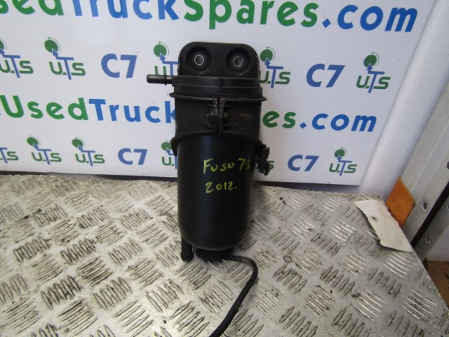 MITSUBISHI FUSO / CANTER FUEL FILTER HOUSING MK666099 - Moteur et pièces pour Camion: photos 1 MITSUBISHI FUSO / CANTER FUEL FILTER HOUSING MK666099 - Moteur et pièces pour Camion: photos 1