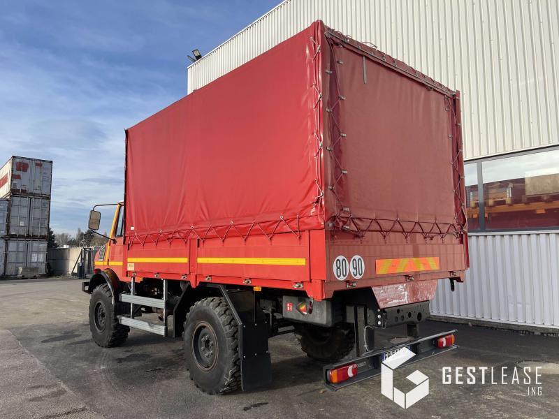 Mercedes UNIMOG 1550 L - Camion à rideaux coulissants: photos 2 Mercedes UNIMOG 1550 L - Camion à rideaux coulissants: photos 2