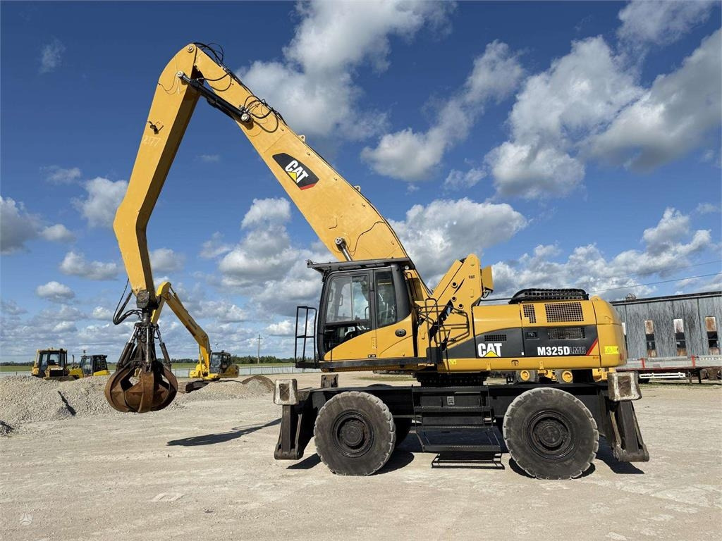 CAT M 325 DLMH - Pelle sur pneus: photos 4 CAT M 325 DLMH - Pelle sur pneus: photos 4