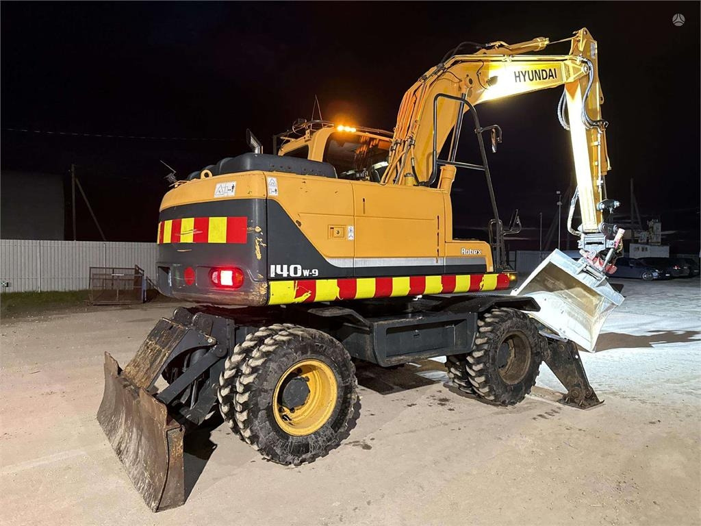 Hyundai Robex 140 W-9 ROTOTILT - Pelle sur pneus: photos 4 Hyundai Robex 140 W-9 ROTOTILT - Pelle sur pneus: photos 4