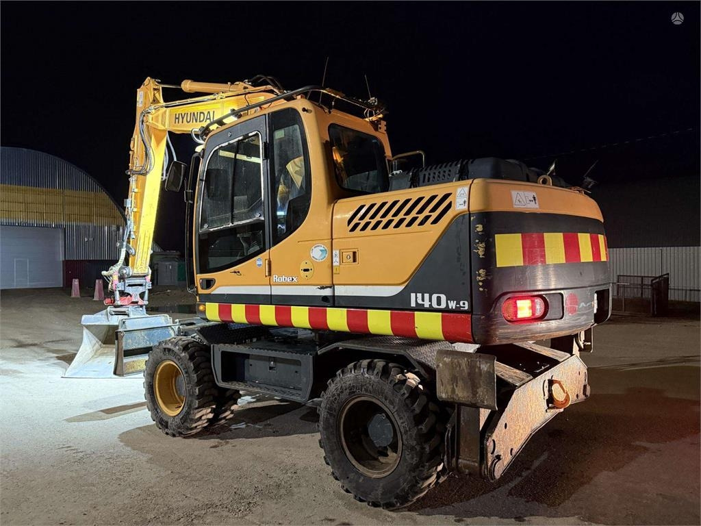 Hyundai Robex 140 W-9 ROTOTILT - Pelle sur pneus: photos 3 Hyundai Robex 140 W-9 ROTOTILT - Pelle sur pneus: photos 3
