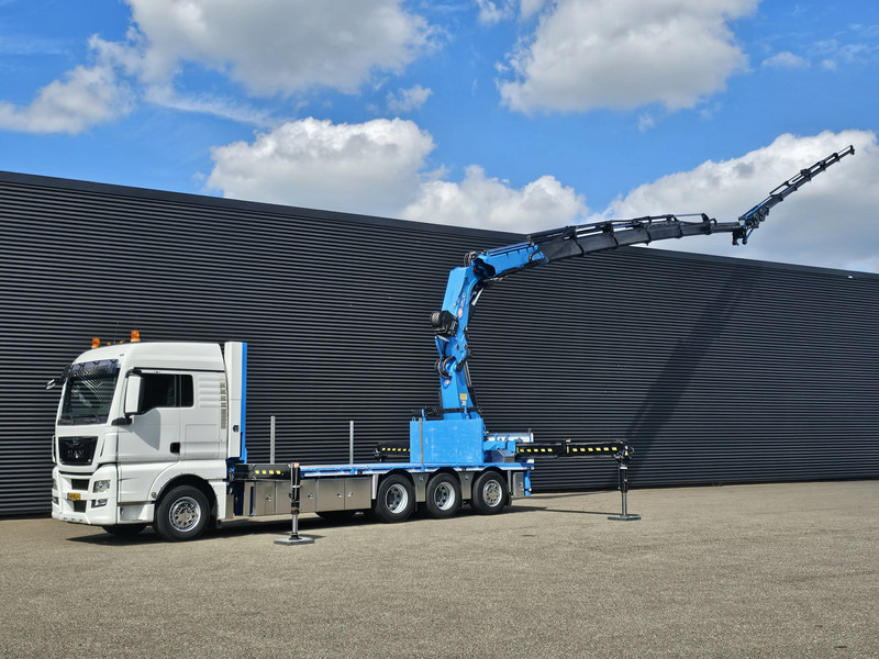 MAN TGX 35.480 8x4-4 / HMF 85 t/m + JIB / WINCH - Camion grue: photos 1 MAN TGX 35.480 8x4-4 / HMF 85 t/m + JIB / WINCH - Camion grue: photos 1