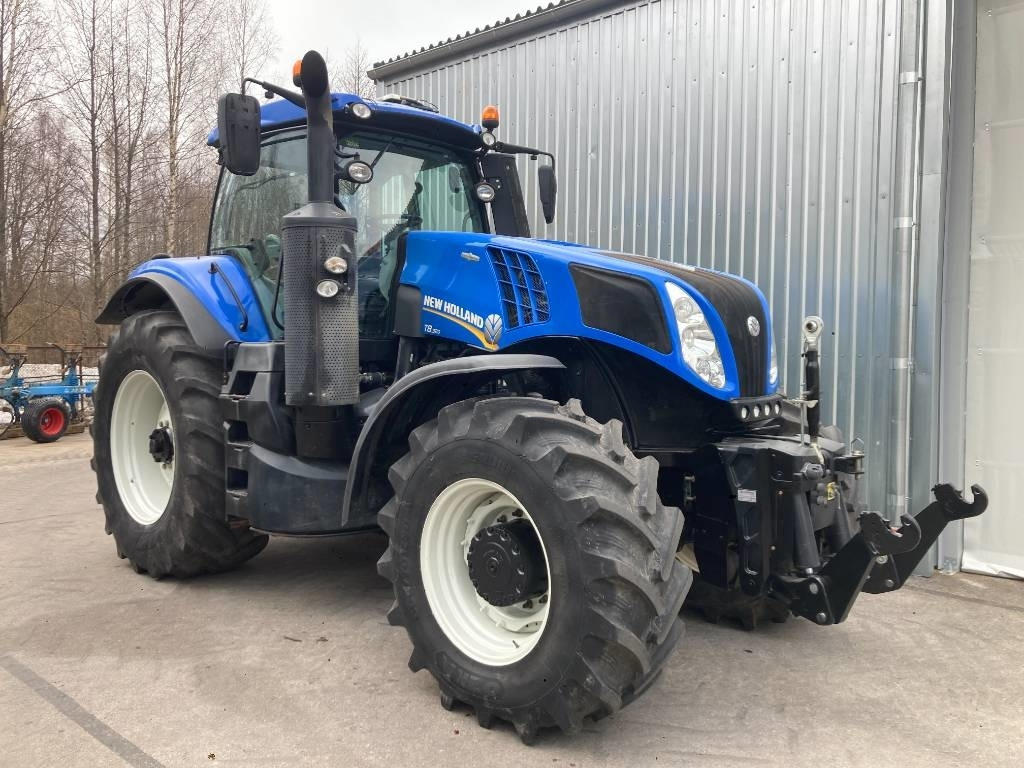 New Holland T 8.320 AC - Tracteur agricole: photos 1 New Holland T 8.320 AC - Tracteur agricole: photos 1