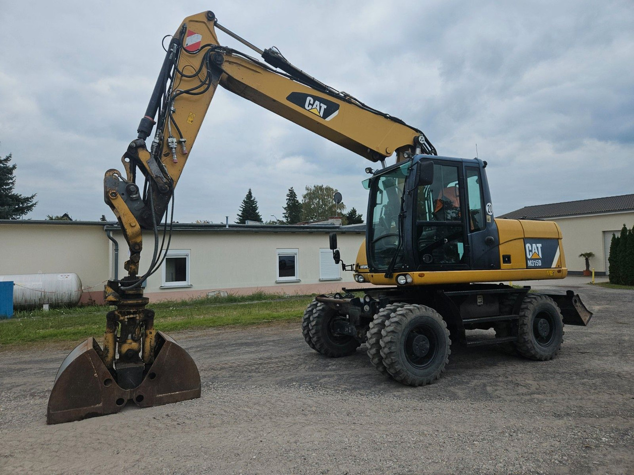 CAT M315D Mobilbagger orig. 4.080h ! 3 Anbauteile - Pelle sur pneus: photos 1 CAT M315D Mobilbagger orig. 4.080h ! 3 Anbauteile - Pelle sur pneus: photos 1