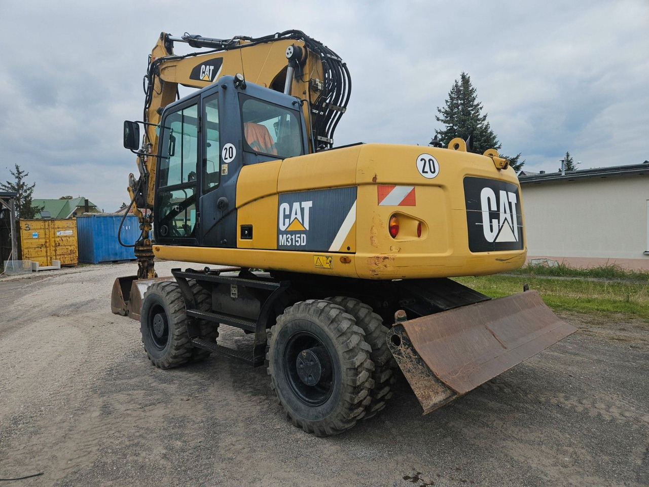 CAT M315D orig. 4.129h - Pelle sur pneus: photos 3 CAT M315D orig. 4.129h - Pelle sur pneus: photos 3