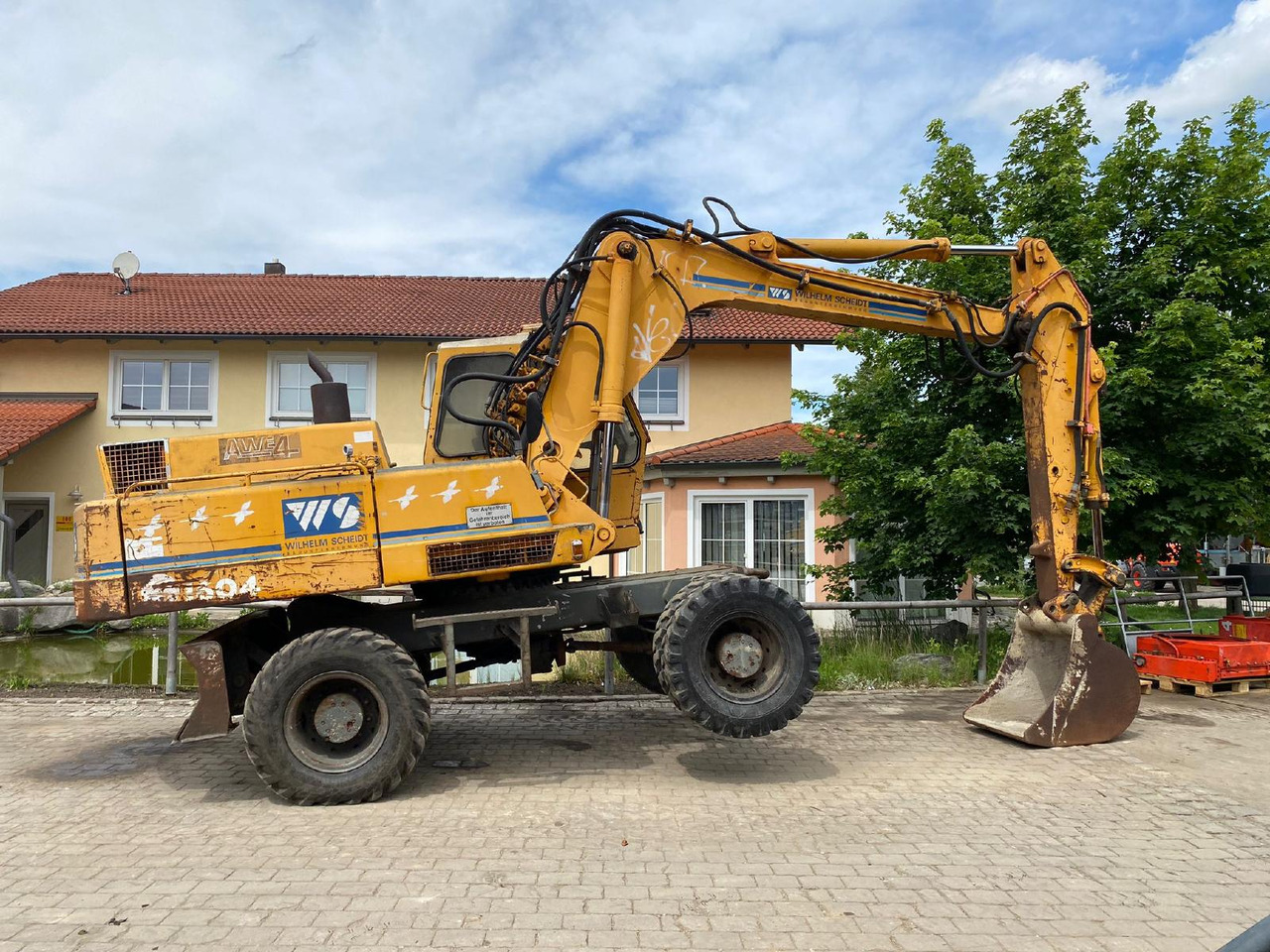 Atlas AB 1604 - Pelle sur pneus: photos 3 Atlas AB 1604 - Pelle sur pneus: photos 3