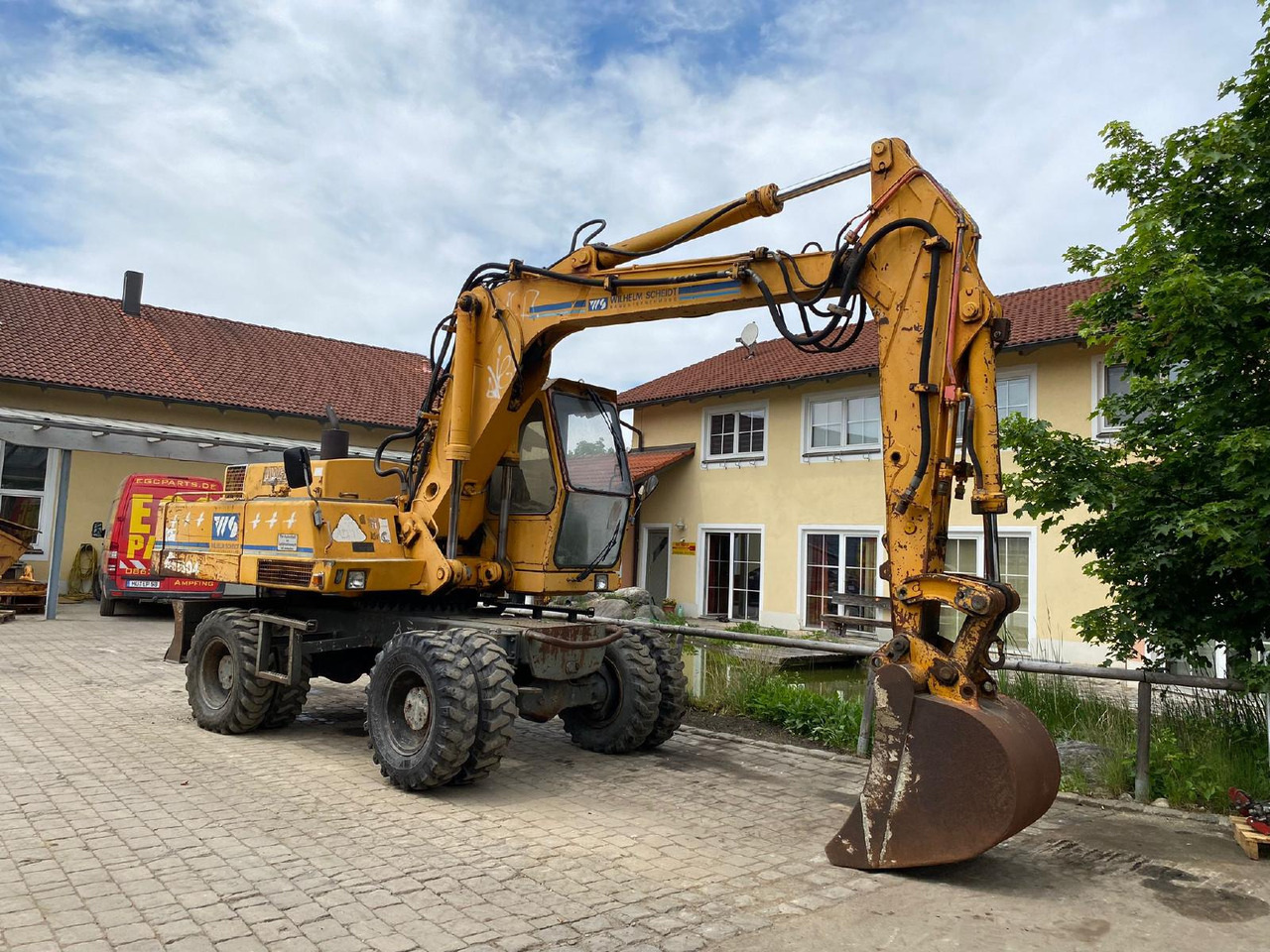 Atlas AB 1604 - Pelle sur pneus: photos 1 Atlas AB 1604 - Pelle sur pneus: photos 1