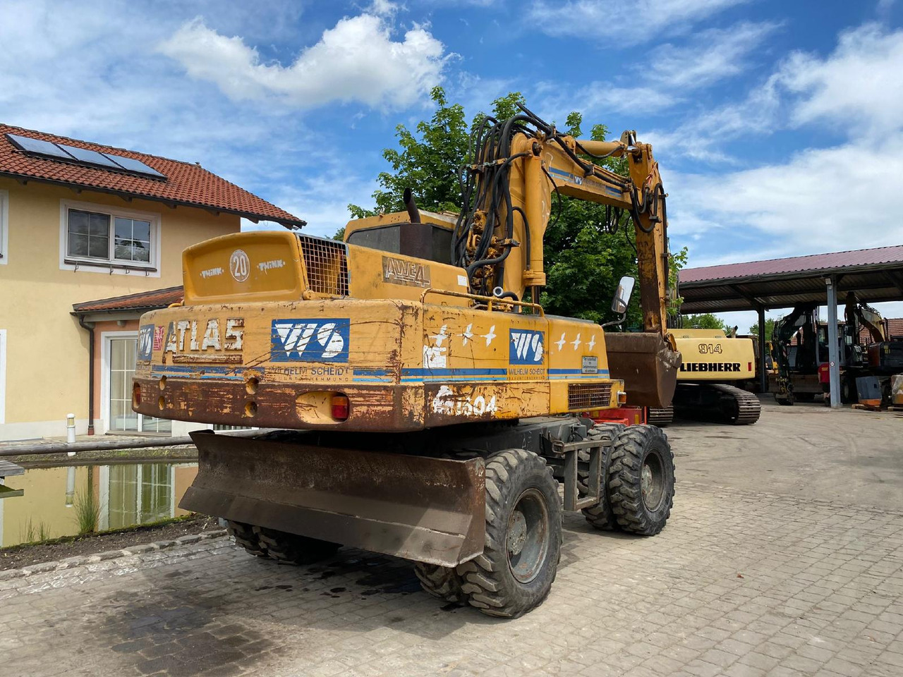 Atlas AB 1604 - Pelle sur pneus: photos 4 Atlas AB 1604 - Pelle sur pneus: photos 4