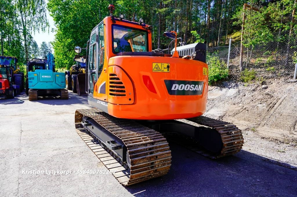 Doosan DX140LCR-5 - Pelle sur chenille: photos 3 Doosan DX140LCR-5 - Pelle sur chenille: photos 3