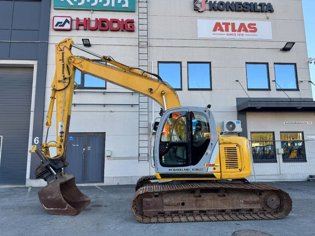 New Holland E 135 SR LC - Pelle sur chenille: photos 1 New Holland E 135 SR LC - Pelle sur chenille: photos 1