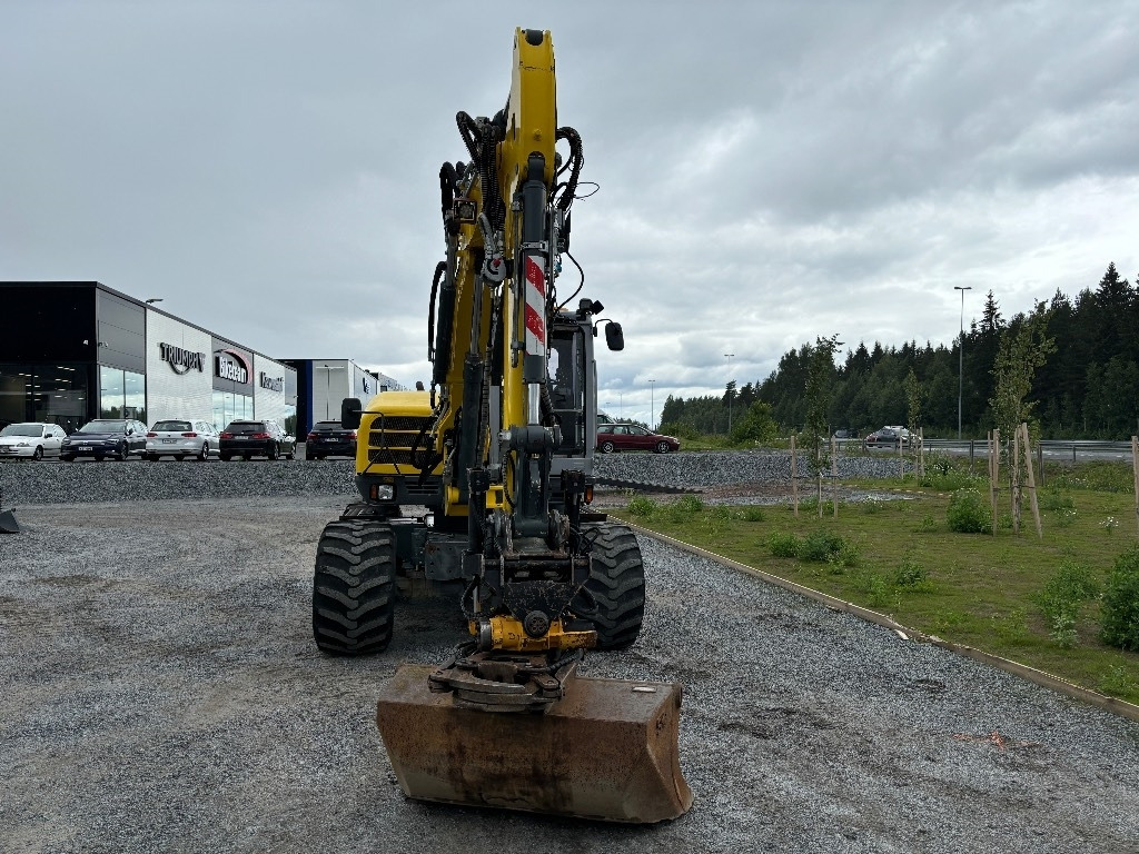 Pelle sur pneus Wacker Neuson EW 100: photos 7