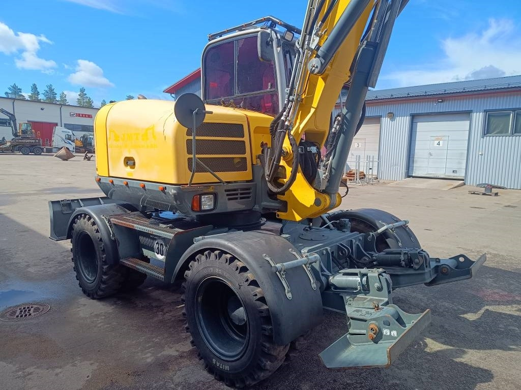 Wacker Neuson EW100 PYÖRITTÄJÄLLÄ - Pelle sur pneus: photos 4 Wacker Neuson EW100 PYÖRITTÄJÄLLÄ - Pelle sur pneus: photos 4