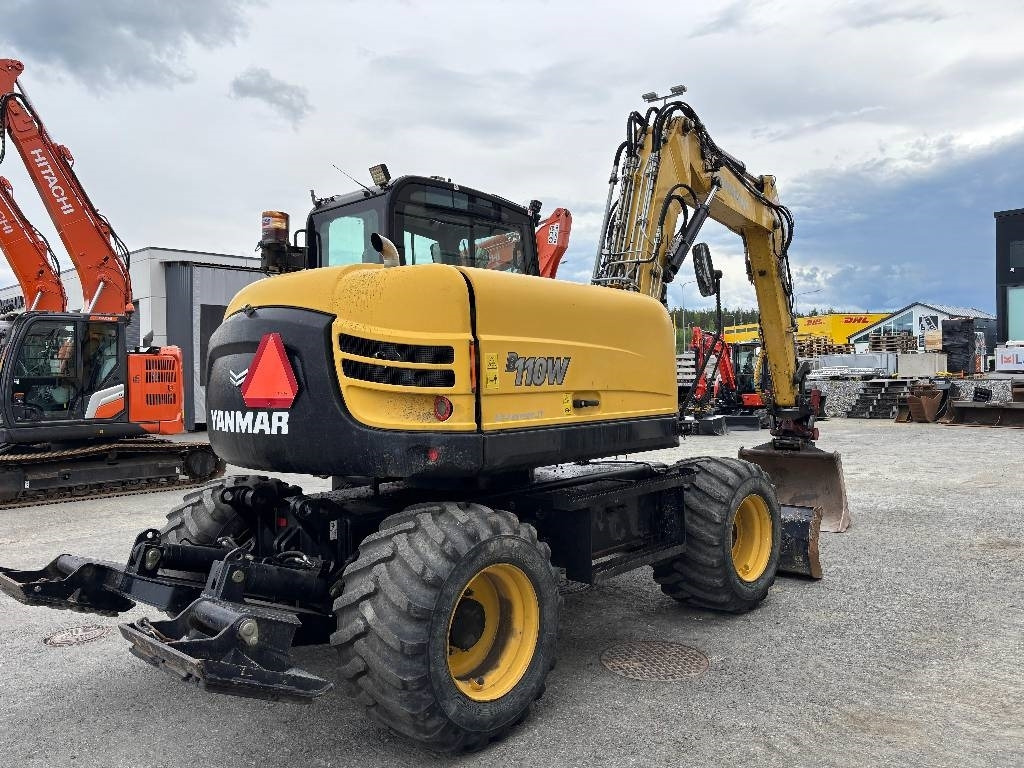 Yanmar B110W PYÖRITTÄJÄLLÄ - Pelle sur pneus: photos 4 Yanmar B110W PYÖRITTÄJÄLLÄ - Pelle sur pneus: photos 4