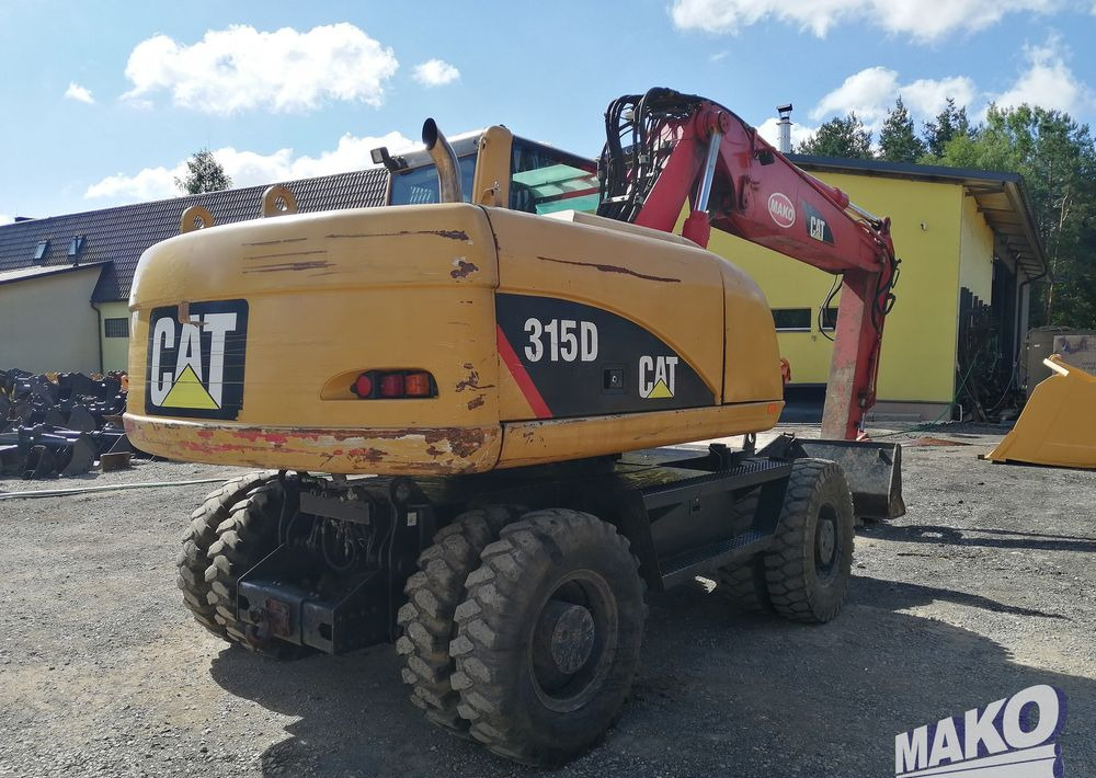 Caterpillar M315 C - Pelle sur pneus: photos 5 Caterpillar M315 C - Pelle sur pneus: photos 5