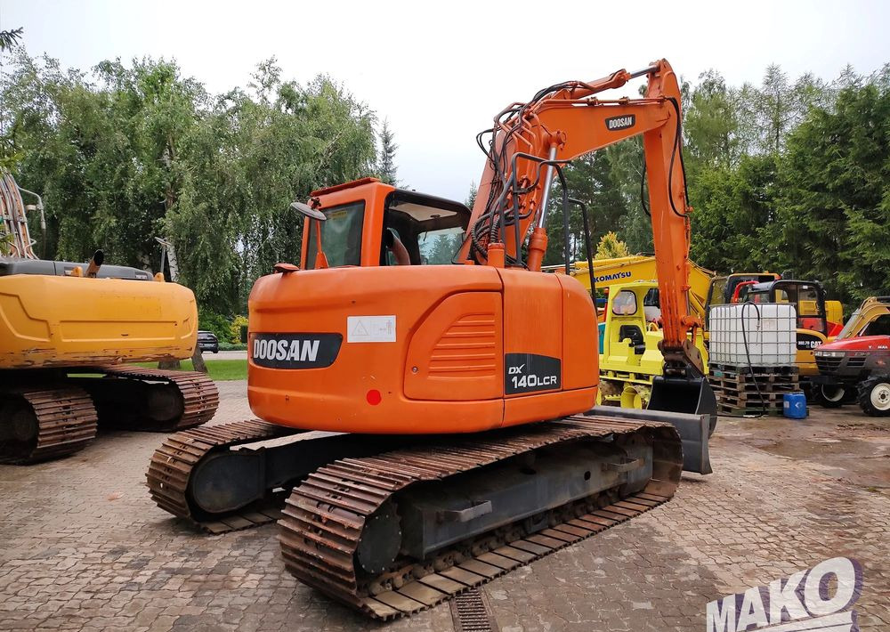 Doosan DX140LCR - Pelle sur chenille: photos 4 Doosan DX140LCR - Pelle sur chenille: photos 4