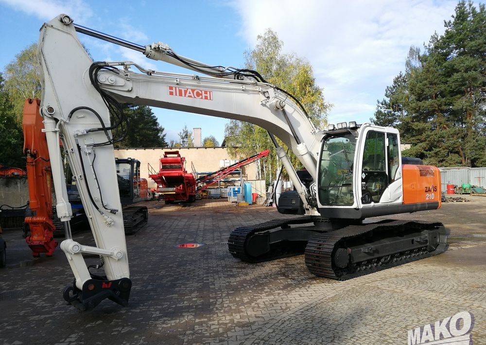 Hitachi ZX210 LC-5B - Pelle sur chenille: photos 1 Hitachi ZX210 LC-5B - Pelle sur chenille: photos 1
