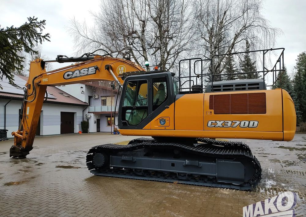 Komatsu CX370D - Pelle sur chenille: photos 1 Komatsu CX370D - Pelle sur chenille: photos 1