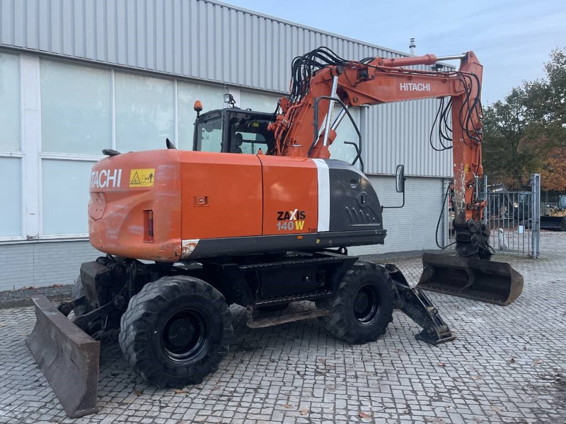 Hitachi ZX 140 W-3 - Pelle sur pneus: photos 5 Hitachi ZX 140 W-3 - Pelle sur pneus: photos 5