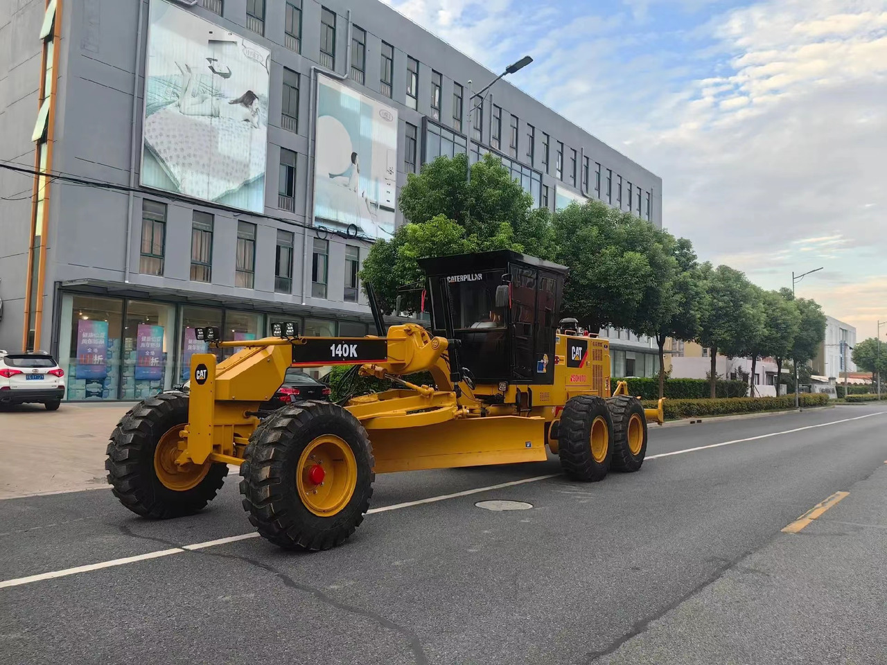 Caterpillar 140K Motor Grader Road Construction Machine - Niveleuse: photos 1 Caterpillar 140K Motor Grader Road Construction Machine - Niveleuse: photos 1