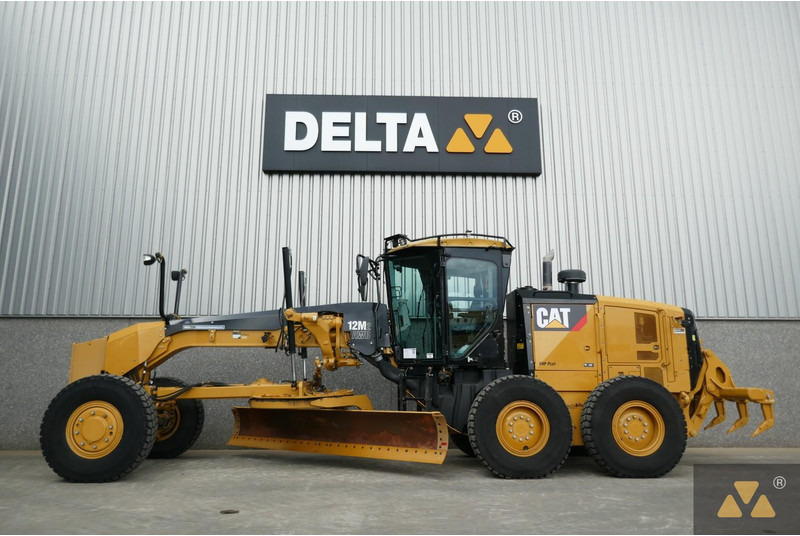 Caterpillar 12M2 AWD - Niveleuse: photos 1 Caterpillar 12M2 AWD - Niveleuse: photos 1