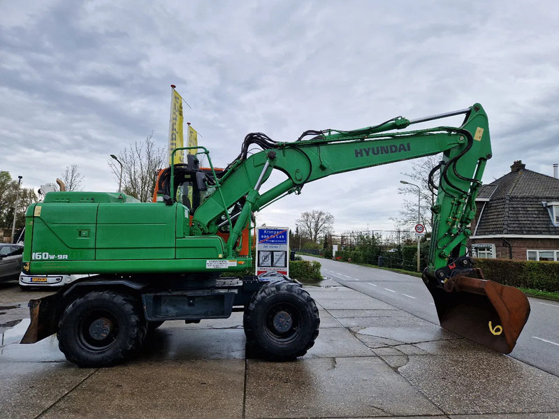 Hyundai Robex 160W-9A met 6-cilinder Cummins motor - Pelle sur pneus: photos 2 Hyundai Robex 160W-9A met 6-cilinder Cummins motor - Pelle sur pneus: photos 2