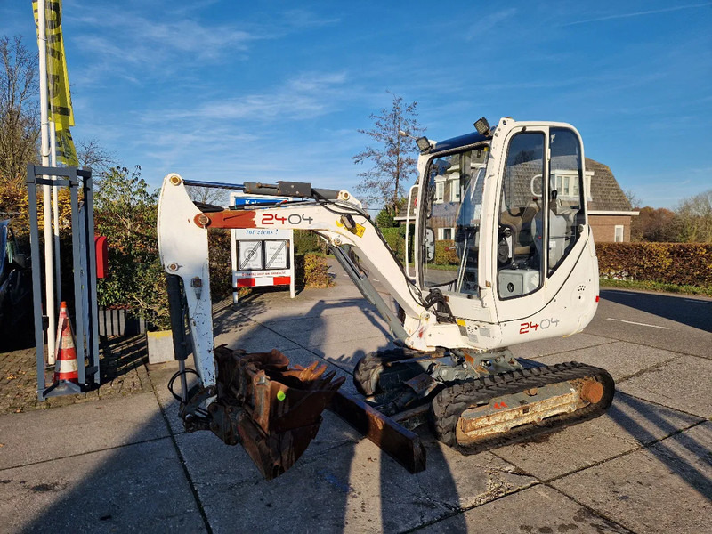 Mini pelle WACKER NEUSON 2404RD kan op een helling draaien: photos 18