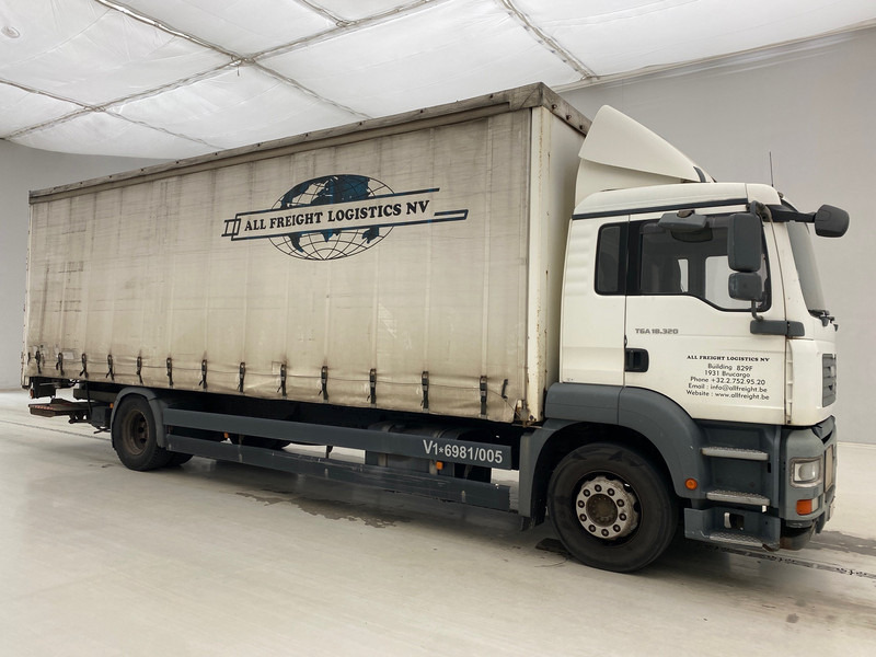 MAN TGA 18.320 - Camion à rideaux coulissants: photos 3 MAN TGA 18.320 - Camion à rideaux coulissants: photos 3