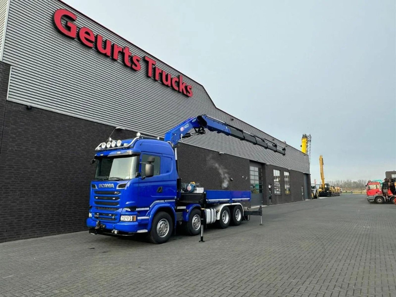 Scania R580 V8 8X4 TREKKER-BAKWAGEN COMBI + HMF 4020-K5 - Camion grue: photos 3 Scania R580 V8 8X4 TREKKER-BAKWAGEN COMBI + HMF 4020-K5 - Camion grue: photos 3