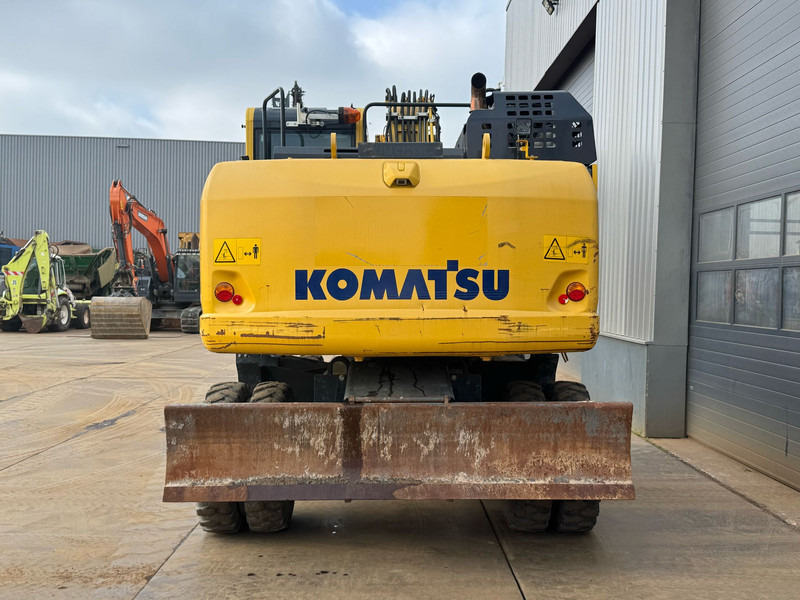 Komatsu PW180-11 - Pelle sur pneus: photos 4 Komatsu PW180-11 - Pelle sur pneus: photos 4