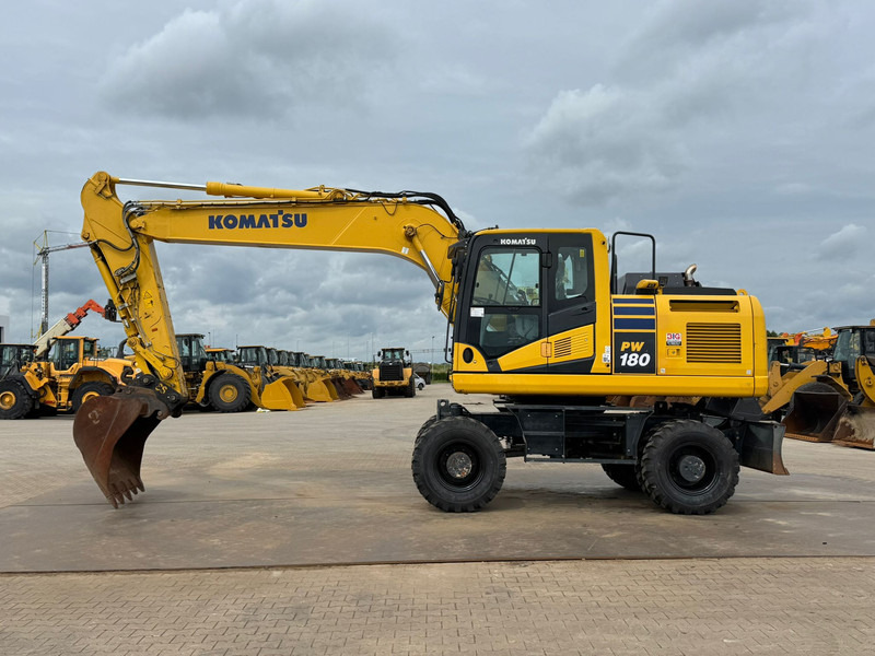 Komatsu PW180-11 - Pelle sur pneus: photos 1 Komatsu PW180-11 - Pelle sur pneus: photos 1