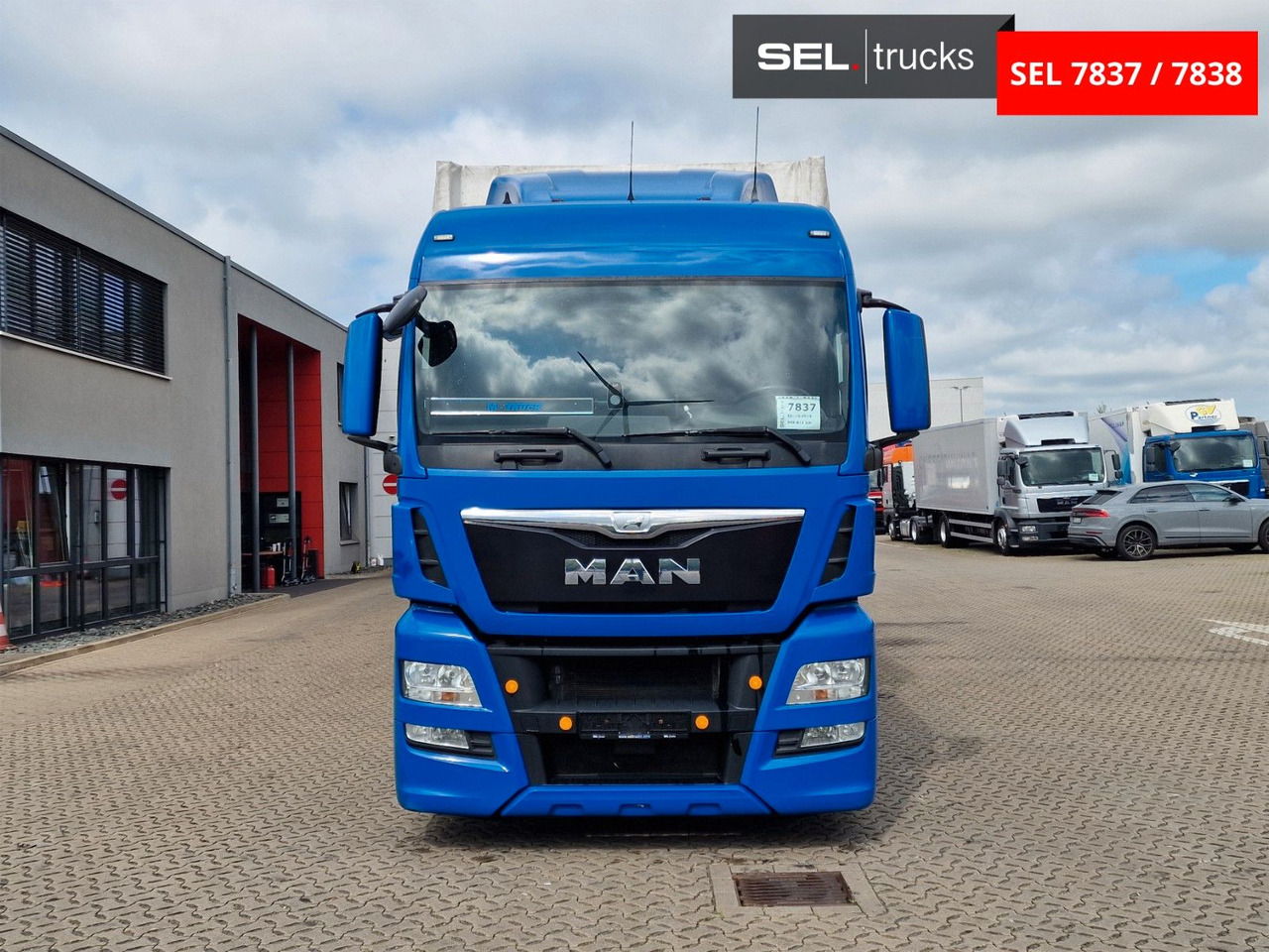 MAN TGX 18.440 4X2 LL-U/ Intarder /Hubdach/Durchlade - Camion à rideaux coulissants: photos 2 MAN TGX 18.440 4X2 LL-U/ Intarder /Hubdach/Durchlade - Camion à rideaux coulissants: photos 2