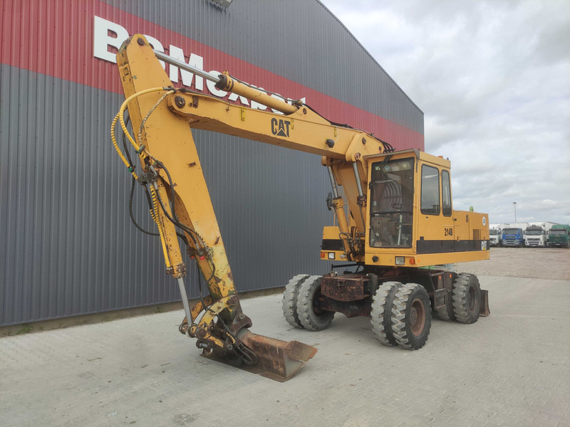 Caterpillar 214 B wheel excavator - Pelle sur pneus: photos 2 Caterpillar 214 B wheel excavator - Pelle sur pneus: photos 2