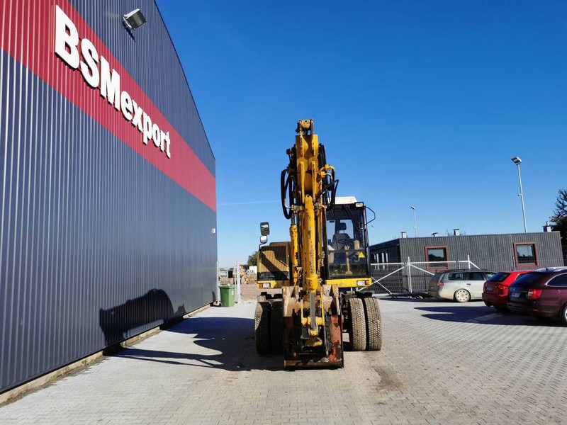 Caterpillar M315 wheel excavator - Pelle sur pneus: photos 3 Caterpillar M315 wheel excavator - Pelle sur pneus: photos 3