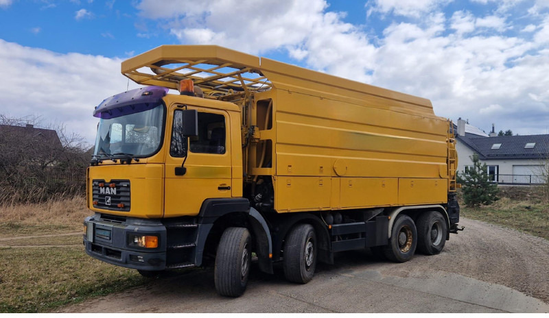 MAN 35.464 channel cleaner, 8x4 full spring, manual - Camion hydrocureur: photos 1 MAN 35.464 channel cleaner, 8x4 full spring, manual - Camion hydrocureur: photos 1