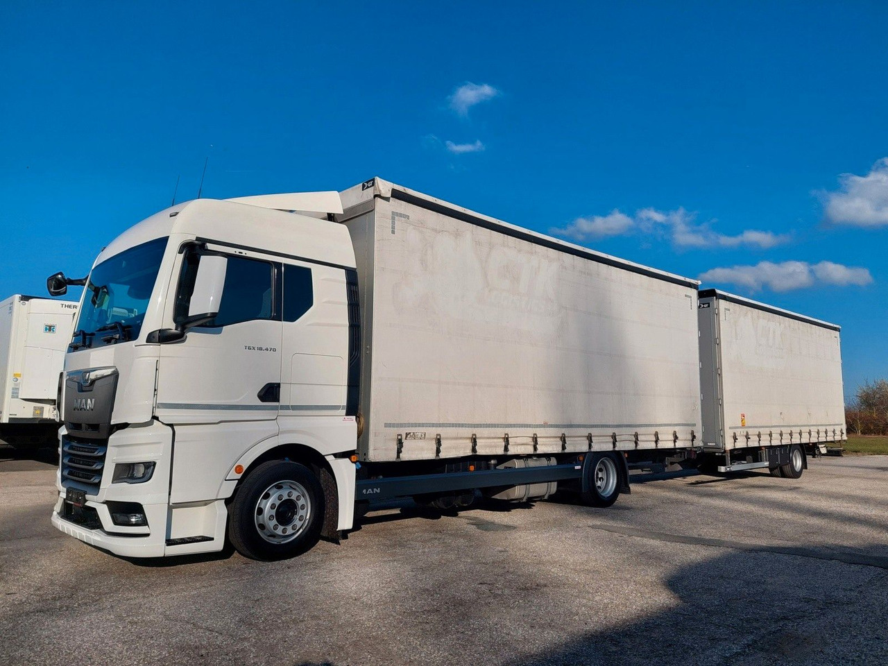 MAN TGX 18.470 LL + Gniotpol G-4080 120 m3 Durchbar - Camion à rideaux coulissants: photos 1 MAN TGX 18.470 LL + Gniotpol G-4080 120 m3 Durchbar - Camion à rideaux coulissants: photos 1