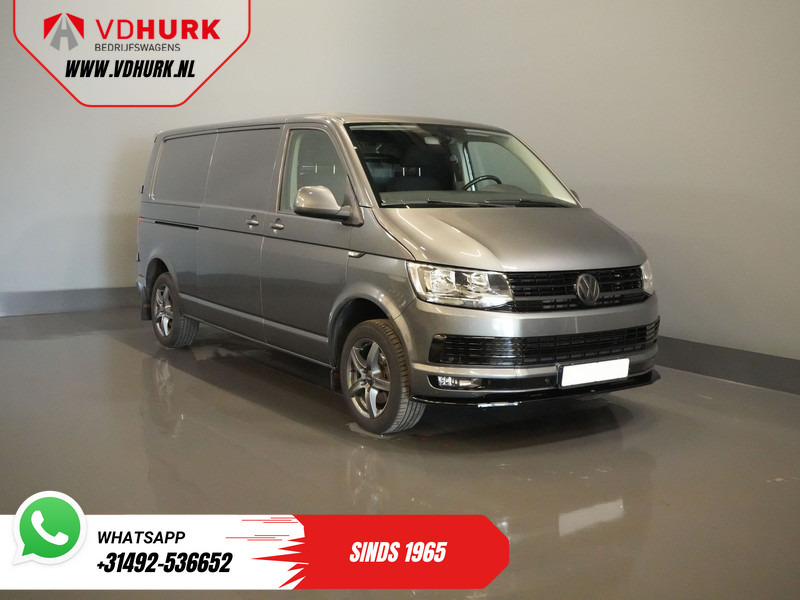Volkswagen Transporter 2.0 TDI 150 pk DSG Aut. L2 BPM VRIJ! Carplay/ 2.5t Trekverm./ LMV/ Cruise/ Navi/ Trekhaak - Fourgonnette: photos 1 Volkswagen Transporter 2.0 TDI 150 pk DSG Aut. L2 BPM VRIJ! Carplay/ 2.5t Trekverm./ LMV/ Cruise/ Navi/ Trekhaak - Fourgonnette: photos 1