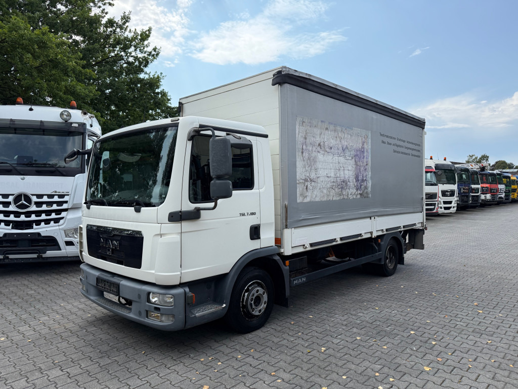 MAN TGL 7.180 4X2 BL 1500Kg Ladebordwand - Camion à rideaux coulissants: photos 1 MAN TGL 7.180 4X2 BL 1500Kg Ladebordwand - Camion à rideaux coulissants: photos 1