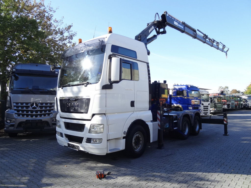MAN TGX 33.480 6X4 Kran MKG 381 bis 20 Meter - Camion grue, Tracteur routier: photos 1 MAN TGX 33.480 6X4 Kran MKG 381 bis 20 Meter - Camion grue, Tracteur routier: photos 1