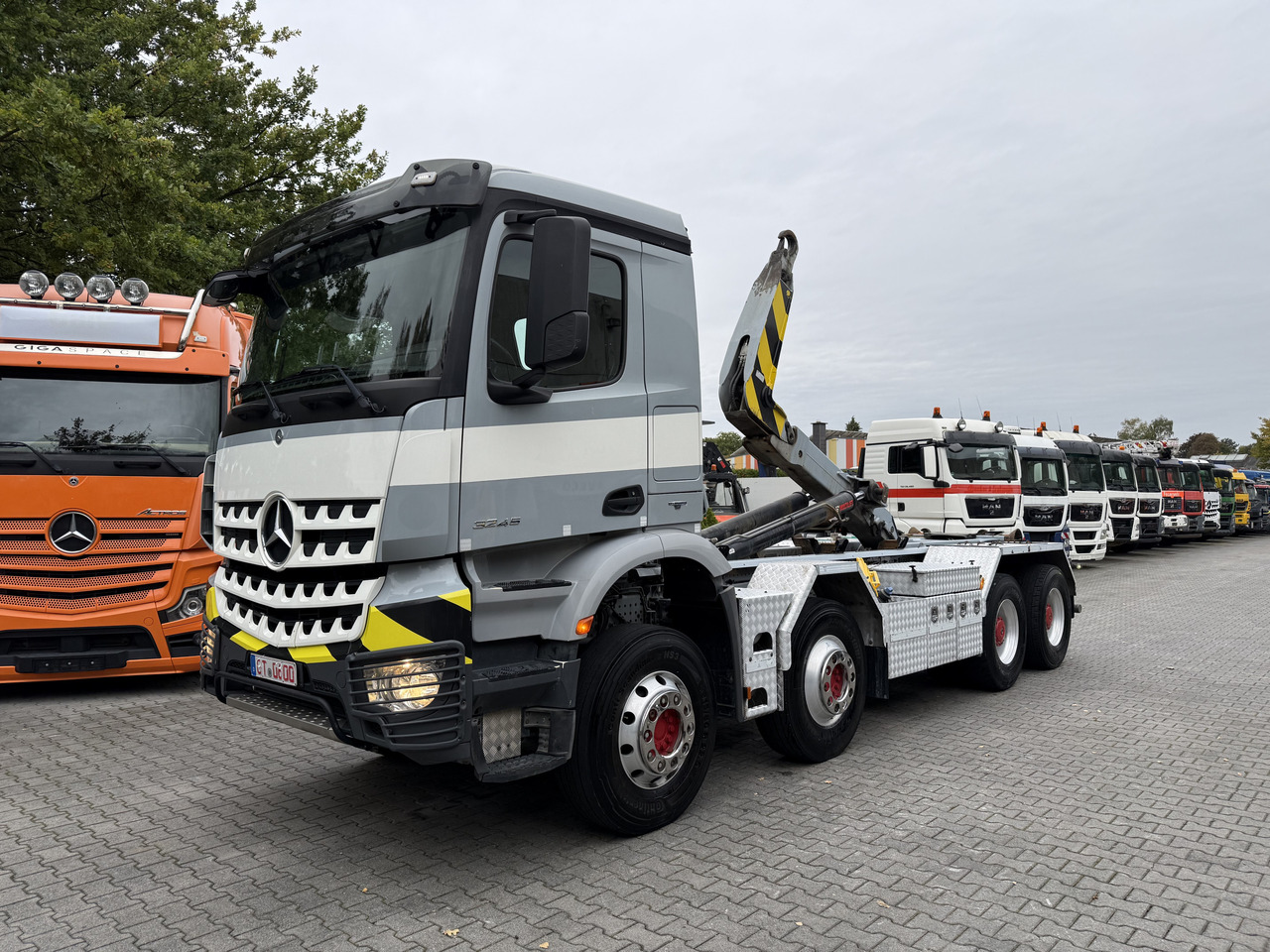 Mercedes-Benz Arocs 3245 K 8X4 Haken - Camion ampliroll: photos 1 Mercedes-Benz Arocs 3245 K 8X4 Haken - Camion ampliroll: photos 1