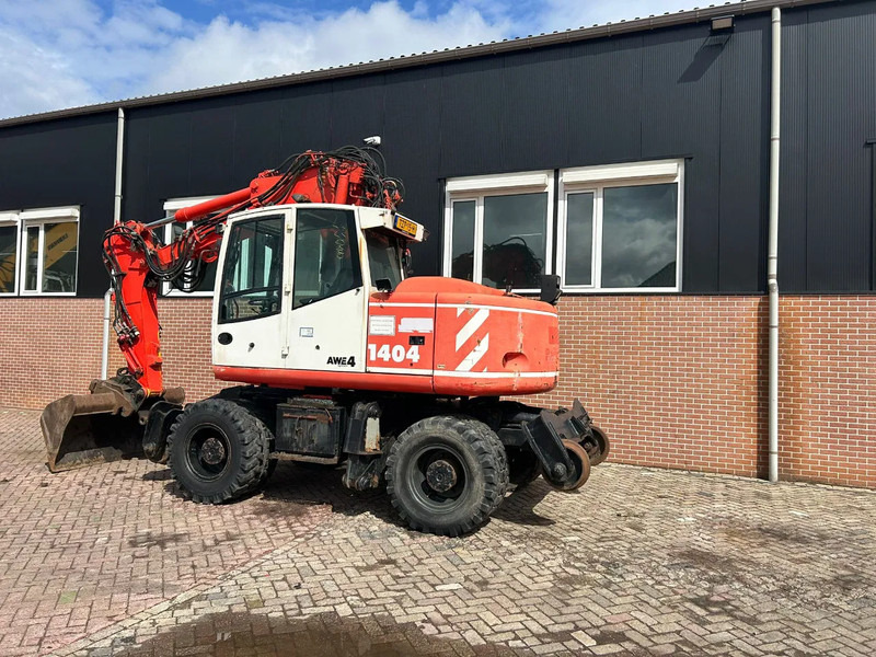 Atlas 1404 - Pelle sur pneus: photos 4 Atlas 1404 - Pelle sur pneus: photos 4