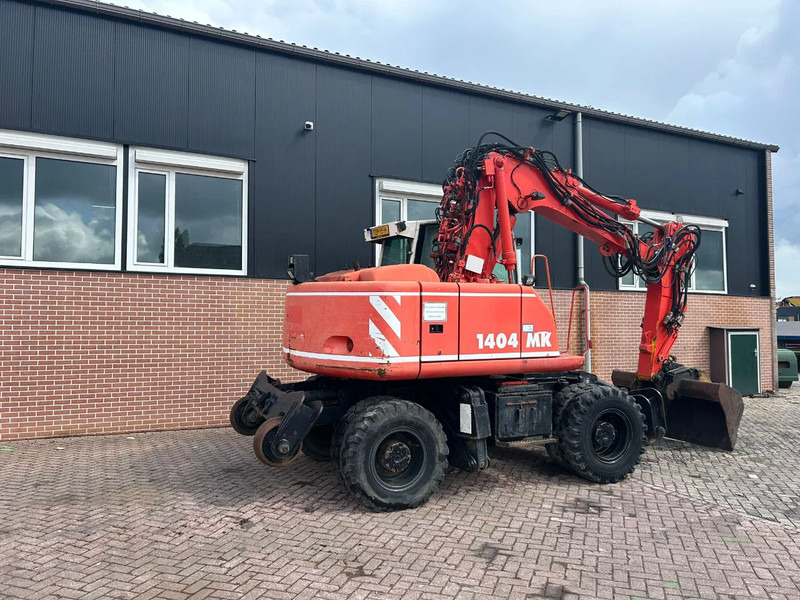 Atlas 1404 - Pelle sur pneus: photos 3 Atlas 1404 - Pelle sur pneus: photos 3