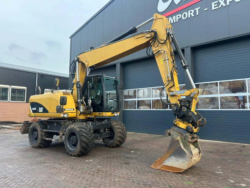 Caterpillar M315D - Pelle sur pneus: photos 2 Caterpillar M315D - Pelle sur pneus: photos 2