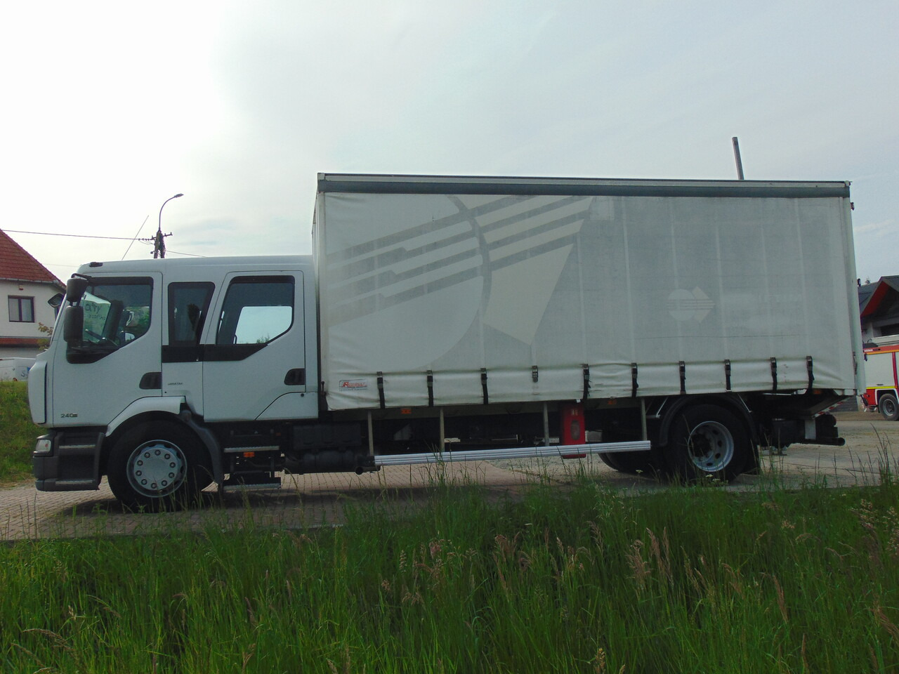 RENAULT Midlum 240DXi - Camion à rideaux coulissants: photos 5 RENAULT Midlum 240DXi - Camion à rideaux coulissants: photos 5