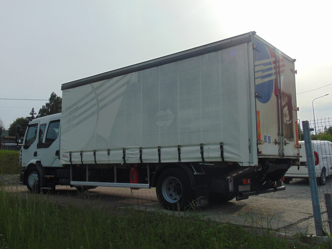 RENAULT Midlum 240DXi - Camion à rideaux coulissants: photos 3 RENAULT Midlum 240DXi - Camion à rideaux coulissants: photos 3