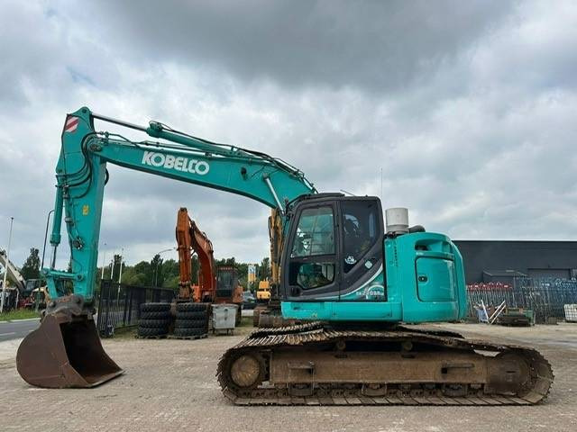 Kobelco SK270SRLC-5 - Pelle sur chenille: photos 1 Kobelco SK270SRLC-5 - Pelle sur chenille: photos 1