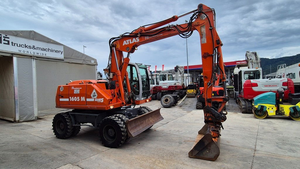 Atlas 1605 - 2005 Year - 2X Buckets - Pelle sur pneus: photos 2 Atlas 1605 - 2005 Year - 2X Buckets - Pelle sur pneus: photos 2